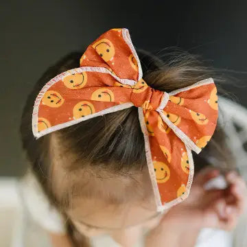 Happy Little Smileys Bow on clip
