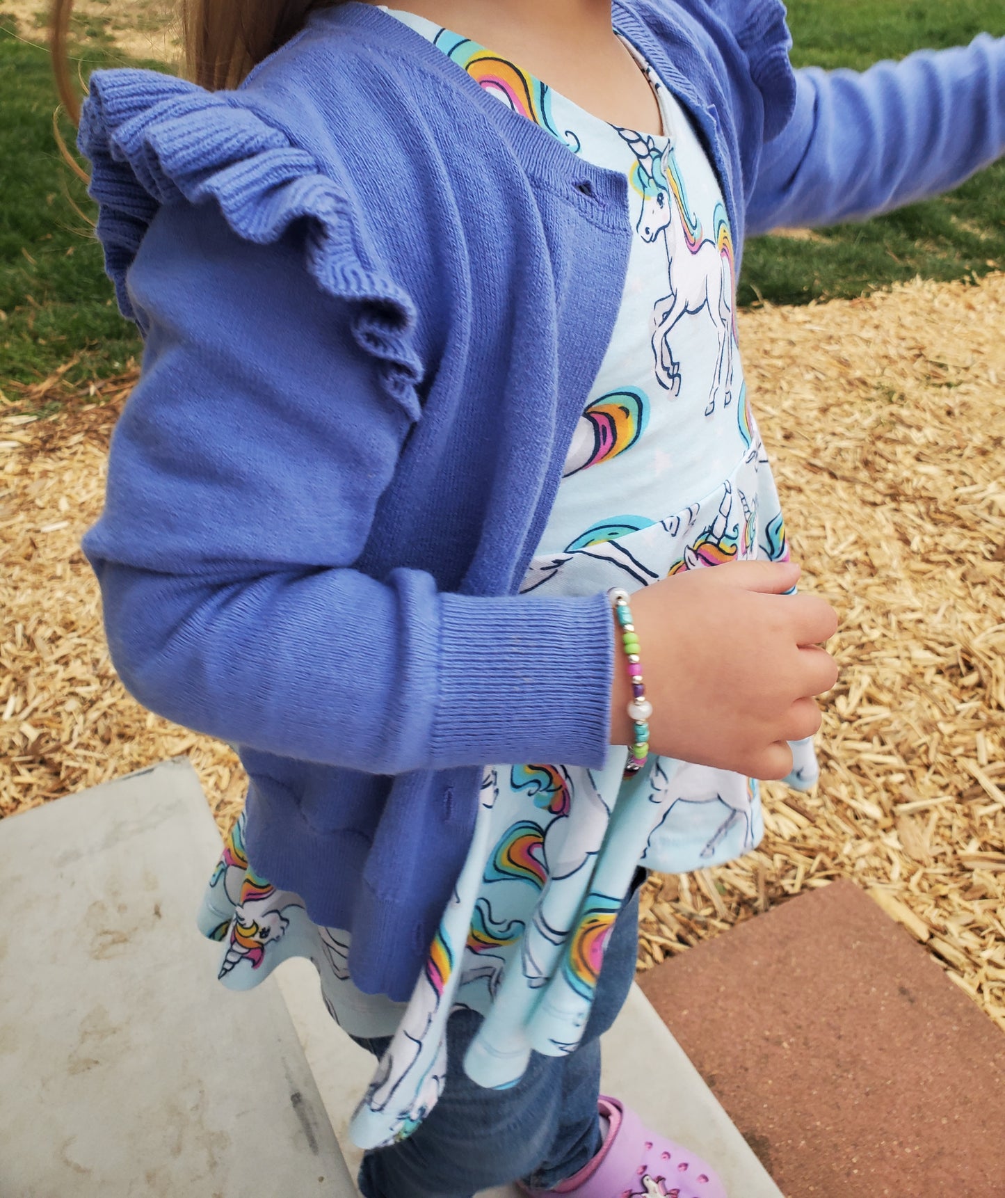 It's all unicorn and rainbows peplum top
